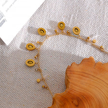 Load image into Gallery viewer, Elegant 18K gold plated stainless steel necklace comes in a gold colour. It is adorned with smaller and bigger colourful cubic zirconia pendants that are circled with a fine golden line. This necklace, because of its luxury look can spice up your evening gown and it is perfect accessory for nice summer evenings. It has lobster clasp and adjustable length.
