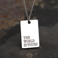 Load image into Gallery viewer, This simple and elegant stainless steel necklace comes in two colours: silver and gold. Its very simple and elegant design is additionally adorned with a rectangle pendant. Pendant has engraved messages of love and support: &quot;Love each other more&quot;, &quot;Always&quot;, &quot;More self love&quot;, &quot;The world is yours&quot; and &quot;Breathe&quot;. This necklace is a perfect gift for your loved ones. The necklace has a lobster clasp.
