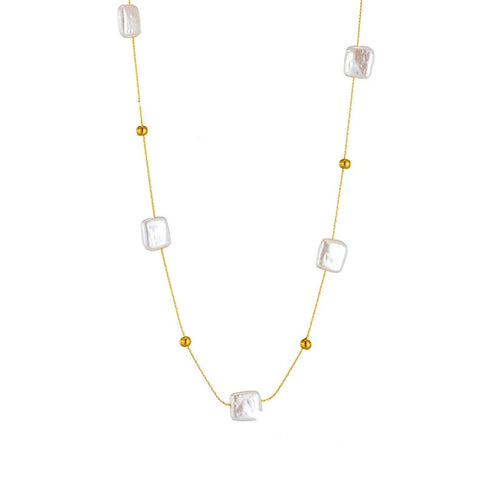 This luxurious necklace is made of stainless steel and freshwater pearls. Combination of square shaped pearls and ultra-thin chain, additionally adorned with small gold balls, can be worn with an everyday outfit but also makes a great accessory for evening night out. It has a size adjustable lobster clasp.