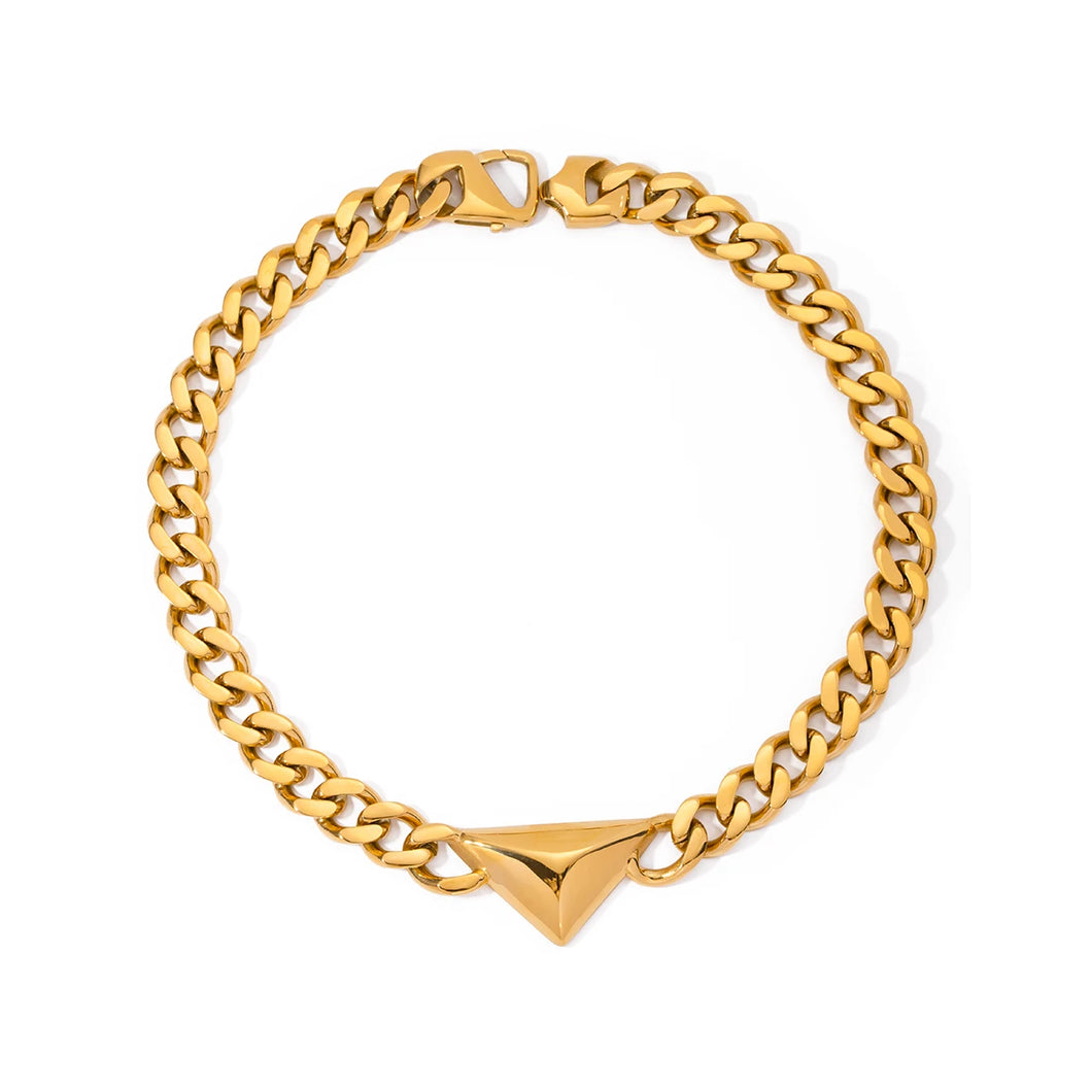 Make a bold yet understated statement with this luxury stainless steel Cuban chain geometric triangle necklace. Featuring a sleek triangle pendant paired with a classic Cuban chain, this unisex piece blends modern design with timeless appeal. Crafted from durable stainless steel, it offers a stylish, tarnish-resistant finish perfect for everyday wear or special occasions. 