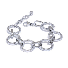 Load image into Gallery viewer, Make a bold style statement with this trendy metal round links bracelet, featuring oversized, notched links that create a striking and modern look. Crafted from high-quality stainless steel, this bracelet is designed to be both waterproof and durable, ensuring it maintains its shine through everyday wear. Its unique, individualistic design makes it the perfect accessory for those who love to stand out with distinctive, fashion-forward pieces.
