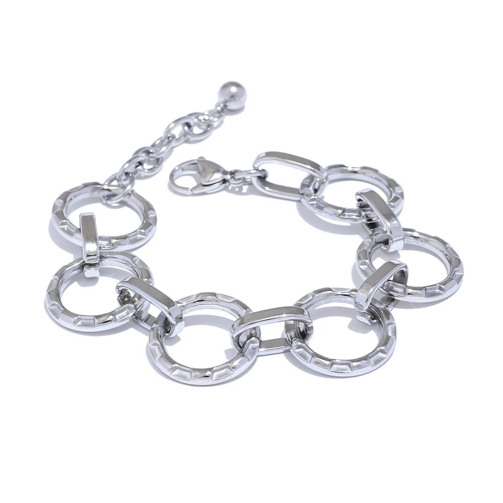 Make a bold style statement with this trendy metal round links bracelet, featuring oversized, notched links that create a striking and modern look. Crafted from high-quality stainless steel, this bracelet is designed to be both waterproof and durable, ensuring it maintains its shine through everyday wear. Its unique, individualistic design makes it the perfect accessory for those who love to stand out with distinctive, fashion-forward pieces.