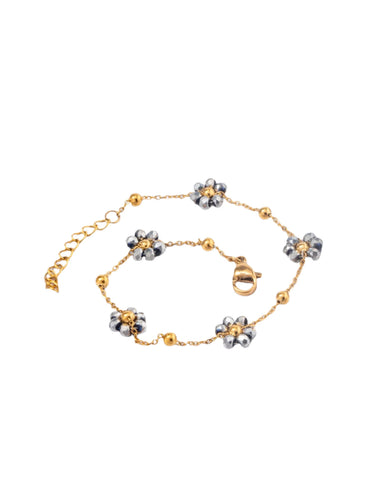 Elevate your look with this delicate stainless steel bracelet, beautifully gold-plated for a touch of luxury and adorned with intricate small grey beaded flowers. The fine craftsmanship of the floral accents adds a subtle charm, making this bracelet an elegant addition to any outfit. Its refined design is perfect for everyday wear or special occasions, offering a graceful balance between simplicity and sophistication.