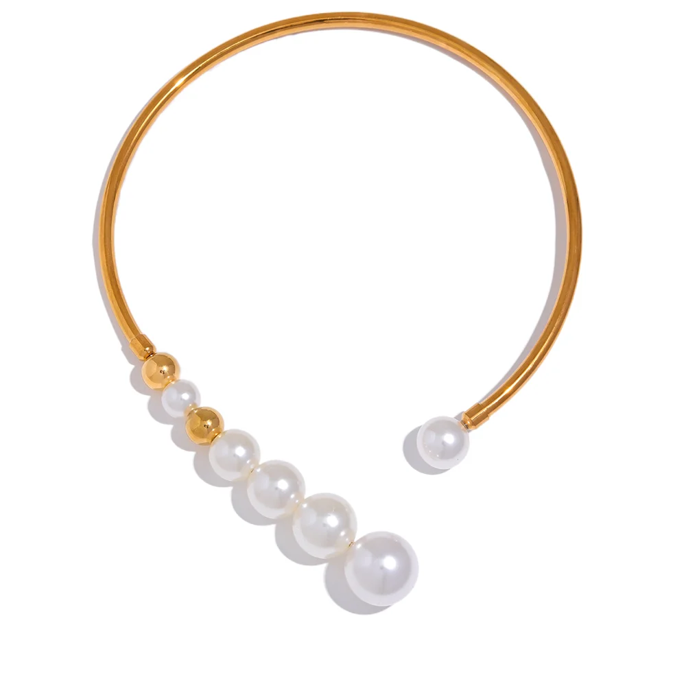 Beautiful statement necklace is made of stainless steel and artificial pearls. The necklace is opened in front and has a row of pearls mixed with stainless steel beads. Pearls are getting bigger and bigger towards the end of the necklace which makes it perfect jewelry piece for your evening gown.