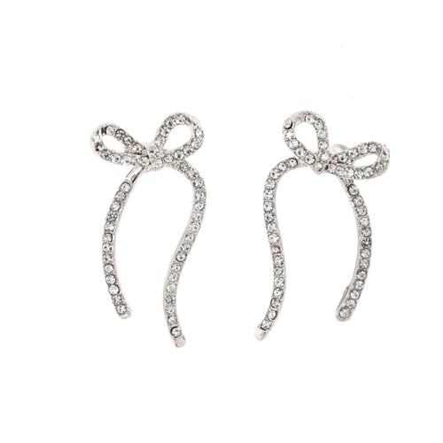 Add a touch of romance and sparkle to your look with these stunning zircon long bowknot dangle earrings. Designed to captivate, each earring features a delicate bow adorned with shimmering zircon stones, creating an elegant and eye-catching effect. Crafted from high-quality stainless steel, these earrings are available in both gold and silver, offering versatile options to match any outfit. 