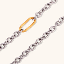 Load image into Gallery viewer, Make a bold statement with this cool 8mm thick stitching O-chain necklace, featuring a stunning silver color with a contrasting gold paperclip buckle for a modern edge. Crafted from premium stainless steel, this durable and sleek piece adds a touch of sophistication to any outfit. Perfect for layering or wearing solo, it&#39;s a versatile accessory for both casual and dressy occasions. A must-have addition to any jewelry collection!
