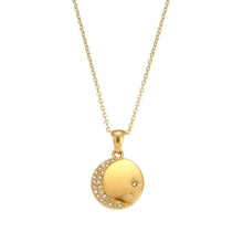 Load image into Gallery viewer, Stainless steel gold plated necklace is made of an elegant and thin chain. There is a round pendant which is adorned with a moon and a star. Both, the moon and the star are made of transparent cubic zirconia. This necklace is a perfect piece for an elegant occasion outfit. It has lobster clasp and adjustable length.
