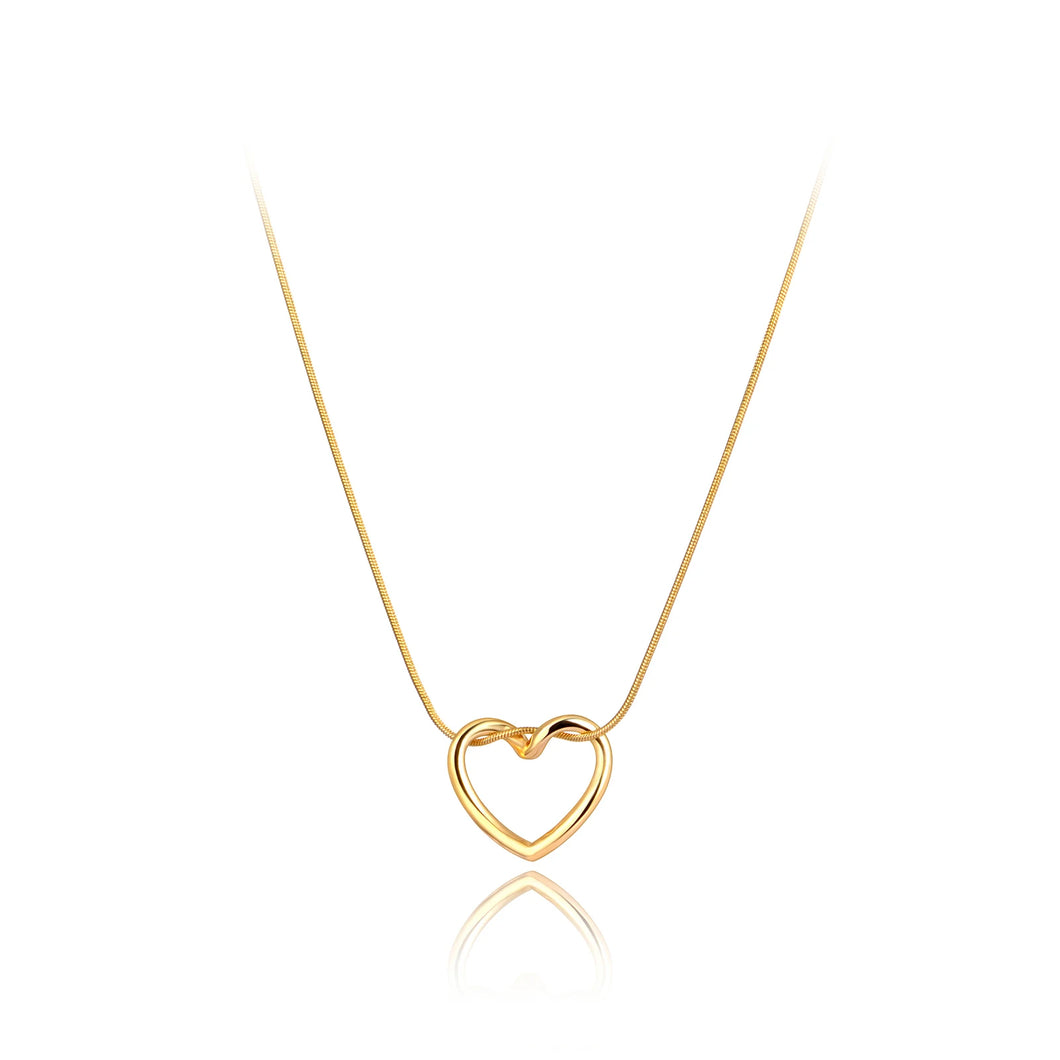 Stainless steel necklace comes in two colours: gold and silver. This simple and elegant necklace is adorned with a twisted hollow heart pendant. It is a perfect piece for an elegant occasion outfit as well as for daily combinations. The necklace has a size adjustable chain with a lobster clasp. 