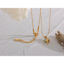 Load image into Gallery viewer, This perfect summer necklace is made of stainless steel and comes in gold colour. It is adorned with three small pendants, two starfish and one cubic zirconia. One starfish is gold and the other is turquoise blue. Chain is very delicate as the whole necklace which makes it a great accessory for any summer outfit. The necklace has lobster clasp and adjustable length.
