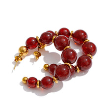 Load image into Gallery viewer, Add a touch of modern elegance to your look with these resin round beads chain C-Shape huggie earrings. Handmade with care, they feature glossy resin round beads paired with a sleek stainless steel chain for a lightweight yet durable finish. Inspired by trendy French fashion, these C-shape huggie earrings offer a stylish balance of chic and contemporary design, making them perfect for everyday wear or special occasions. A must-have statement accessory for women who love unique, fashionable jewelry.
