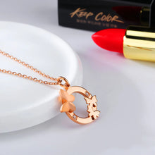 Load image into Gallery viewer, This elegant 18K gold plated necklace is made of stainless steel and comes in a rose gold colour. It is adorned with a beautiful pendant in a shape of a circle. There are three butterflies on the circle as well as two cubic zirconia which makes this pendant very elegant and classy. This necklace is a perfect accessory for a glamorous outfit. It has a size adjustable chain with a lobster clasp.&nbsp;
