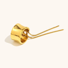 Load image into Gallery viewer, Add a bold yet elegant touch to your everyday style with this tassel wrapped stainless steel women’s Rrng. Featuring a unique wrapped design with trendy tassel detailing, this ring is crafted from durable stainless steel and finished with luxurious PVD gold plating for long-lasting shine. Versatile and fashionable, it’s perfect for daily wear or special occasions and makes a thoughtful gift for women who love modern, multifunctional jewelry.
