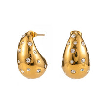 Load image into Gallery viewer, These chic chubby waterdrop stud earrings bring a touch of elegance with their sleek gold and silver color options and embedded zircon accents that add a hint of sparkle. Crafted from durable stainless steel, they’re designed to be both stylish and long-lasting, making them a versatile accessory for any occasion.
