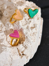 Load image into Gallery viewer, Add a playful touch to your style with this candy sweet natural stone heart open ring. Crafted from stainless steel and plated in real gold, this adjustable ring features a charming heart-shaped natural stone centerpiece, evoking the fun and vibrant energy. Its open design ensures a comfortable, custom fit, making it perfect for everyday wear or as a standout accessory for special occasions.
