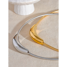 Load image into Gallery viewer, Stainless steel choker necklace comes in gold and silver colour. It is adorned with an interesting cilindar shape which makes this necklace, although simple, still very interesting. The necklace has magnetic clasp and it is a perfect accessory to any evening dress or suit.
