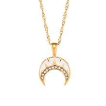 Load image into Gallery viewer, This very elegant pendant necklace is made out of 18K gold plated stainless steel. Pendant is in a shape of a moon and it comes in two colours: black or white. The moon is additionally adorned with a line of cubic zirconia. Necklace can be combined with an elegant dinning outfit and it can be a perfect gift for a special one. It has a size adjustable lobster clasp.&nbsp;
