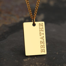 Load image into Gallery viewer, This simple and elegant stainless steel necklace comes in two colours: silver and gold. Its very simple and elegant design is additionally adorned with a rectangle pendant. Pendant has engraved messages of love and support: &quot;Love each other more&quot;, &quot;Always&quot;, &quot;More self love&quot;, &quot;The world is yours&quot; and &quot;Breathe&quot;. This necklace is a perfect gift for your loved ones. The necklace has a lobster clasp.
