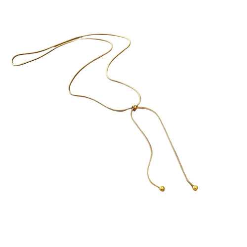 This lovely fashion necklace is made out of stainless steel and is real gold plated. Its beautiful, elegant chain is adorned with two small balls on its end. The necklace is adjustable with a clasp in a shape of a little ball as well that makes the necklace even prettier. This interesting vintage necklace can be worn with an everyday outfit but also makes a great accessory for evening night out.