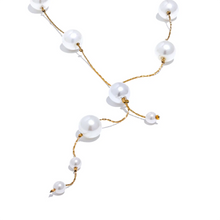 Load image into Gallery viewer, This elegant necklace features a delicate stainless steel chain adorned with imitation pearl beads, spaced gracefully along its length for a refined, charming look. The short, lightweight design is enhanced by a hanging chain detail, adding a touch of sophistication that’s perfect for galas, evening events, or daily wear. 
