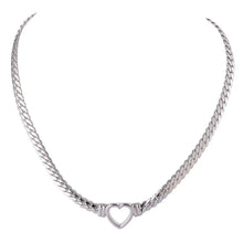 Load image into Gallery viewer, Stainless steel 18K gold plated necklace comes in a gold and silver colour. It is made of a thick and big chain which is adorned with a heart contour in the middle. This luxurious necklace is perfect accessory for any evening gown. It has lobster clasp and adjustable length.
