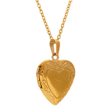 Load image into Gallery viewer, This romantic 18K gold plated stainless steel necklace comes in a gold colour. It is adorned with a beautiful carved heart pendant. The heart medallion can be opened and it can be used for photo saving. Heart necklace is perfect for spicing up your romantic outfit and it is also very suitable gift for your loved ones. It has lobster clasp and adjustable length.
