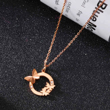 Load image into Gallery viewer, This elegant 18K gold plated necklace is made of stainless steel and comes in a rose gold colour. It is adorned with a beautiful pendant in a shape of a circle. There are three butterflies on the circle as well as two cubic zirconia which makes this pendant very elegant and classy. This necklace is a perfect accessory for a glamorous outfit. It has a size adjustable chain with a lobster clasp.&nbsp;
