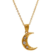 Load image into Gallery viewer, This romantic stainless steel necklace comes in a gold colour. Its has very mice thin chain which is adorned with a nice moon pendant. The moon has several cubic zirconia on its surface which makes it more chic and glamorous. The chain necklace is perfect for spicing up your daily or evening outfit. It has lobster clasp and adjustable length.
