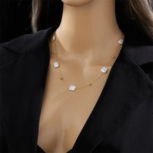 Load image into Gallery viewer, This luxurious necklace is made of stainless steel and freshwater pearls. Combination of square shaped pearls and ultra-thin chain, additionally adorned with small gold balls, can be worn with an everyday outfit but also makes a great accessory for evening night out. It has a size adjustable lobster clasp.
