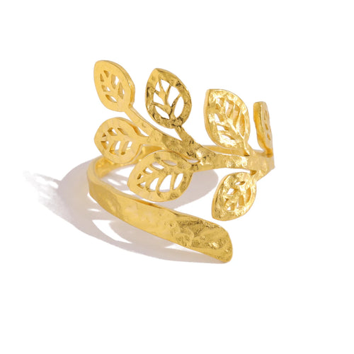 This striking stainless steel ring features a captivating design with a delicate leaf motif paired with an eye-catching irregular line, offering a perfect blend of nature-inspired elegance and modern artistry. Coated in luxurious 18K gold plating, the ring’s unique texture adds depth and character, making it a standout piece for any occasion. Waterproof and crafted for lasting durability, it’s as practical as it is stylish—ideal for the trendsetter who loves to wear distinctive, high-fashion pieces that ref