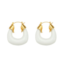 Load image into Gallery viewer, Add a pop of color to your summer look with these bold and stylish chunky resin hoop earrings! Available in vibrant blue or classic white, these lightweight hoops are crafted from durable, waterproof stainless steel for all-day wear. Perfect for vacations, beach days, or everyday outfits, they’re your new go-to statement accessory!
