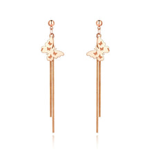 Load image into Gallery viewer, Add graceful elegance to your look with these trendy stainless steel butterfly charm earrings. Featuring delicate long chain tassels, these animal-inspired earrings bring a touch of sparkle and sophistication to any outfit. Perfect for women who love chic, nature-themed jewelry, they’re an ideal accessory for both everyday wear and special occasions.
