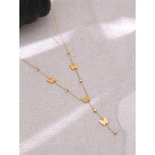 Load image into Gallery viewer, This beautiful and elegant 18K plated stainless steel necklace comes in a gold colour. It is adorned with small cubic zirconia pendants and stainless steel butterflies. There is a small chain hanging at the bottom of the necklace also adorned with the same pattern. This chic necklace is perfect for spicing up your evening outfit. It has lobster clasp and adjustable length.
