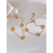 Load image into Gallery viewer, This delicate and classy necklace is made out of stainless steel with 18K gold plating. It consists of a thin chain with five flower charms and it comes in gold colour. It has a size adjustable lobster clasp. It can be worn as a perfect summer accessory.
