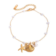 Load image into Gallery viewer, This exquisite gold-tone stainless steel anklet is the ultimate summer accessory, designed to elevate any warm-weather look. The delicate chain is adorned with flawless pearl imitations and three charming pendants—a starfish, a seashell, and a pearl—evoking the beauty of the sea and adding a touch of coastal elegance. With its secure lobster clasp and adjustable chain, this anklet offers a comfortable, customizable fit.
