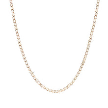 Load image into Gallery viewer, Elevate your style with this luxurious gold plated tennis necklace, featuring dazzling AAA-grade zircon stones for a radiant sparkle. Crafted from durable stainless steel, this trendy necklace combines elegance and durability, making it perfect for everyday wear or special occasions. A timeless accessory that adds a touch of sophistication to any outfit, it’s a must-have for any jewelry collection or a thoughtful gift for someone special.
