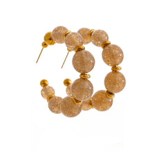 Load image into Gallery viewer, Add a touch of modern elegance to your look with these resin round beads chain C-Shape huggie earrings. Handmade with care, they feature glossy resin round beads paired with a sleek stainless steel chain for a lightweight yet durable finish. Inspired by trendy French fashion, these C-shape huggie earrings offer a stylish balance of chic and contemporary design, making them perfect for everyday wear or special occasions. A must-have statement accessory for women who love unique, fashionable jewelry.
