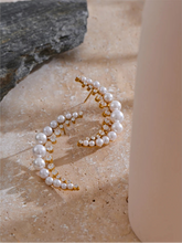 Load image into Gallery viewer, Add a touch of elegance to your look with these high-grade moon stud earrings, featuring dazzling cubic zirconia and luminous simulated pearls. Crafted from durable stainless steel, these delicate earrings offer a timeless yet modern charm, perfect for both casual and formal occasions. A stylish and sophisticated gift, they make a stunning addition to any jewelry collection.

