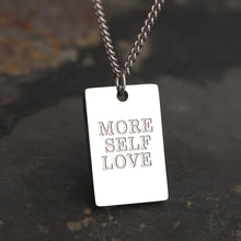 Load image into Gallery viewer, This simple and elegant stainless steel necklace comes in two colours: silver and gold. Its very simple and elegant design is additionally adorned with a rectangle pendant. Pendant has engraved messages of love and support: &quot;Love each other more&quot;, &quot;Always&quot;, &quot;More self love&quot;, &quot;The world is yours&quot; and &quot;Breathe&quot;. This necklace is a perfect gift for your loved ones. The necklace has a lobster clasp.
