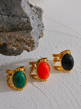 Load image into Gallery viewer, Add a bold touch of color to your ensemble with this eye-catching open adjustable ring, featuring a choice of rich red, black, or green natural stones. Crafted from high-quality stainless steel and plated in radiant gold, this ring combines elegance with everyday practicality—its waterproof finish ensures long-lasting beauty and shine. The open, adjustable design offers a comfortable and versatile fit, making it perfect for women who love versatile yet luxurious accessories. 
