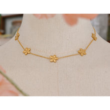 Load image into Gallery viewer, This delicate and classy necklace is made out of stainless steel with 18K gold plating. It consists of a thin chain with five flower charms and it comes in gold colour. It has a size adjustable lobster clasp. It can be worn as a perfect summer accessory.
