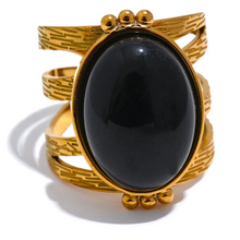 Load image into Gallery viewer, Add a bold touch of color to your ensemble with this eye-catching open adjustable ring, featuring a choice of rich red, black, or green natural stones. Crafted from high-quality stainless steel and plated in radiant gold, this ring combines elegance with everyday practicality—its waterproof finish ensures long-lasting beauty and shine. The open, adjustable design offers a comfortable and versatile fit, making it perfect for women who love versatile yet luxurious accessories. 
