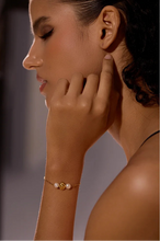 Load image into Gallery viewer, Elevate your style with this natural pearl and stainless steel beaded bracelet, a perfect blend of vintage charm and modern elegance. Featuring luminous natural pearls and gold-colored stainless steel beads, this piece adds a sophisticated touch to any outfit. Durable and timeless, it’s a versatile accessory that can be worn alone or stacked, making it a perfect gift for any stylish woman.
