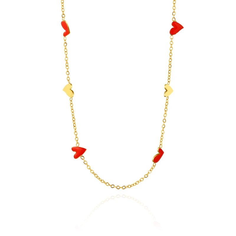 Charming gold plated stainless steel necklace comes in a gold colour. It is adorned with irregular shaped hearts in red and gold combination. This necklace is a perfect piece for any daily or evening outfit. It is also a great present for your loved ones. The necklace has a lobster clasp and adjustable length.