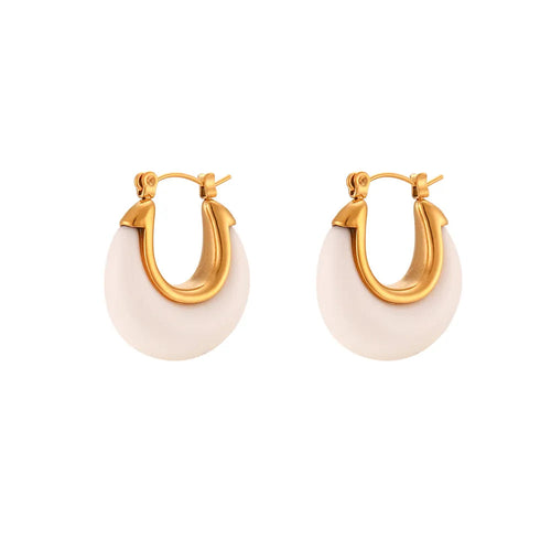 Elevate your everyday style with these chic acrylic white hoop earrings, featuring a delicate gold inner line for a touch of luxe. The small, round design paired with a sturdy stainless steel hoop makes them both stylish and durable. Whether you're dressing up or down, these versatile earrings add a perfect pop of modern elegance to any outfit.