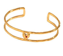 Load image into Gallery viewer, Elevate your style with this exquisite double layer hollow open bracelet, featuring a striking red enamel heart at its center. Crafted from durable 316L stainless steel and plated in luxurious 18K gold, this statement piece exudes elegance and charm. Available in both gold and silver, this bracelet adds a versatile touch to complement any outfit.
