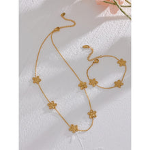 Load image into Gallery viewer, This delicate and classy necklace is made out of stainless steel with 18K gold plating. It consists of a thin chain with five flower charms and it comes in gold colour. It has a size adjustable lobster clasp. It can be worn as a perfect summer accessory.
