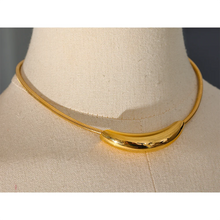 Load image into Gallery viewer, Stainless steel choker necklace comes in gold and silver colour. It is adorned with an interesting cilindar shape which makes this necklace, although simple, still very interesting. The necklace has magnetic clasp and it is a perfect accessory to any evening dress or suit.
