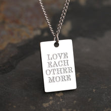 Load image into Gallery viewer, This simple and elegant stainless steel necklace comes in two colours: silver and gold. Its very simple and elegant design is additionally adorned with a rectangle pendant. Pendant has engraved messages of love and support: &quot;Love each other more&quot;, &quot;Always&quot;, &quot;More self love&quot;, &quot;The world is yours&quot; and &quot;Breathe&quot;. This necklace is a perfect gift for your loved ones. The necklace has a lobster clasp.
