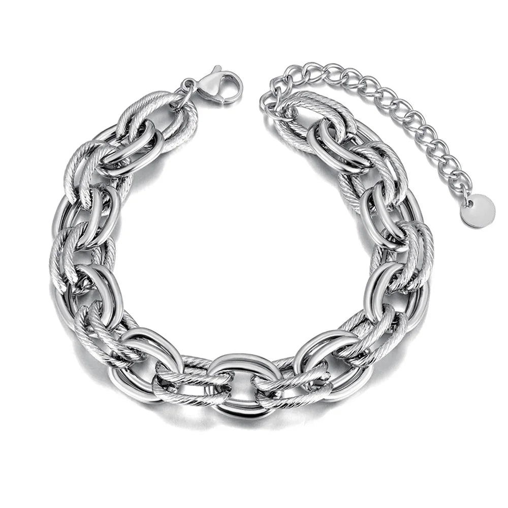 Make a bold statement with this oval circle handmade chain bracelet, meticulously crafted with alternating notched links for added texture and style. Plated in luxurious 18K gold, this stunning piece exudes sophistication and elegance, while the stainless steel construction ensures it remains waterproof and tarnish-free for lasting beauty. Perfect for any occasion, this eye-catching bracelet offers both durability and fashion-forward design, making it a versatile accessory for daily wear or special events.