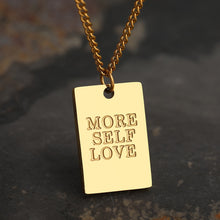 Load image into Gallery viewer, This simple and elegant stainless steel necklace comes in two colours: silver and gold. Its very simple and elegant design is additionally adorned with a rectangle pendant. Pendant has engraved messages of love and support: &quot;Love each other more&quot;, &quot;Always&quot;, &quot;More self love&quot;, &quot;The world is yours&quot; and &quot;Breathe&quot;. This necklace is a perfect gift for your loved ones. The necklace has a lobster clasp.
